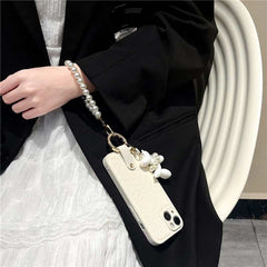 Camellia Flower and Puppy Pearl Charm Leather Crossbody Lanyard Phone Case for iPhone 11 Series